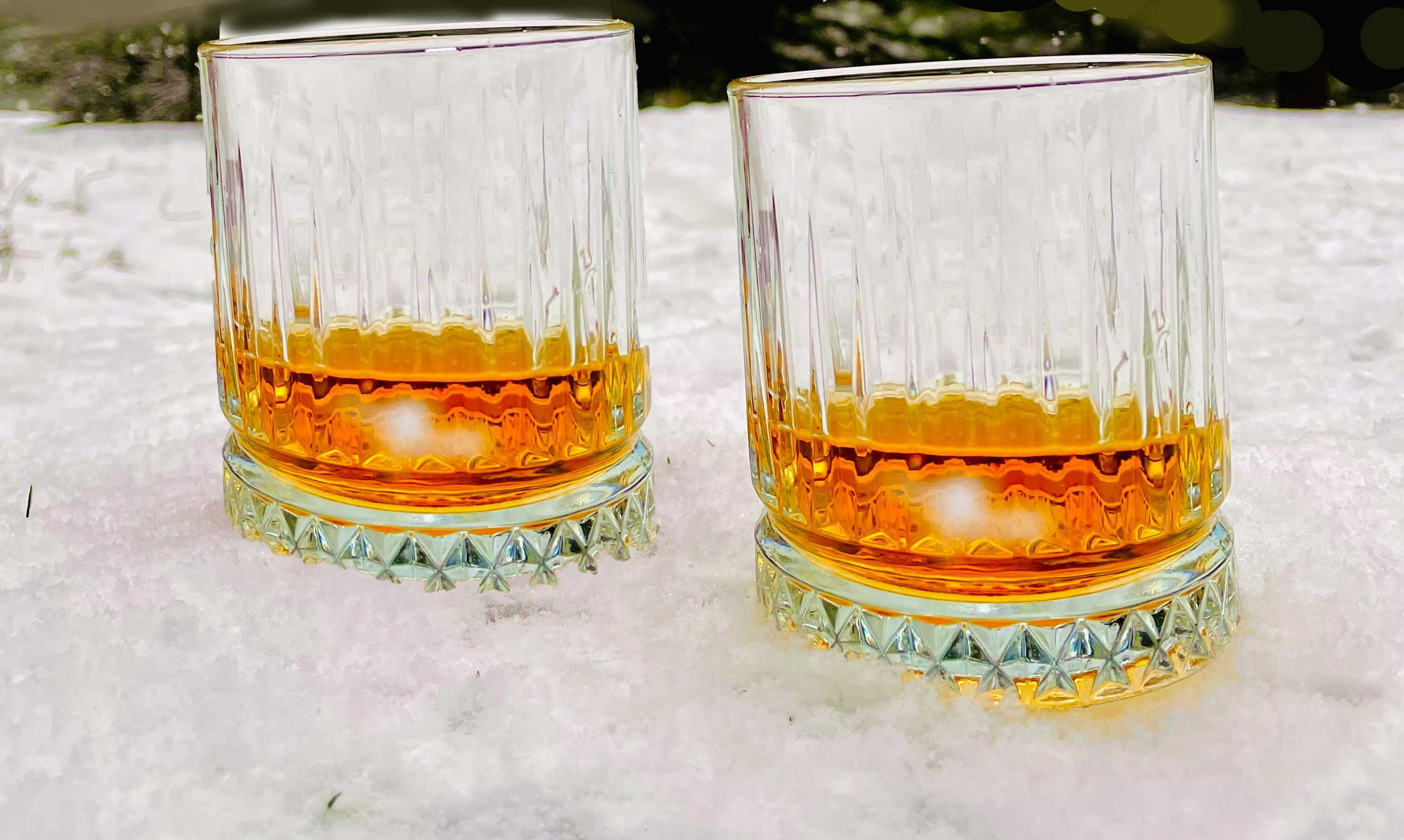 two glasses in snow