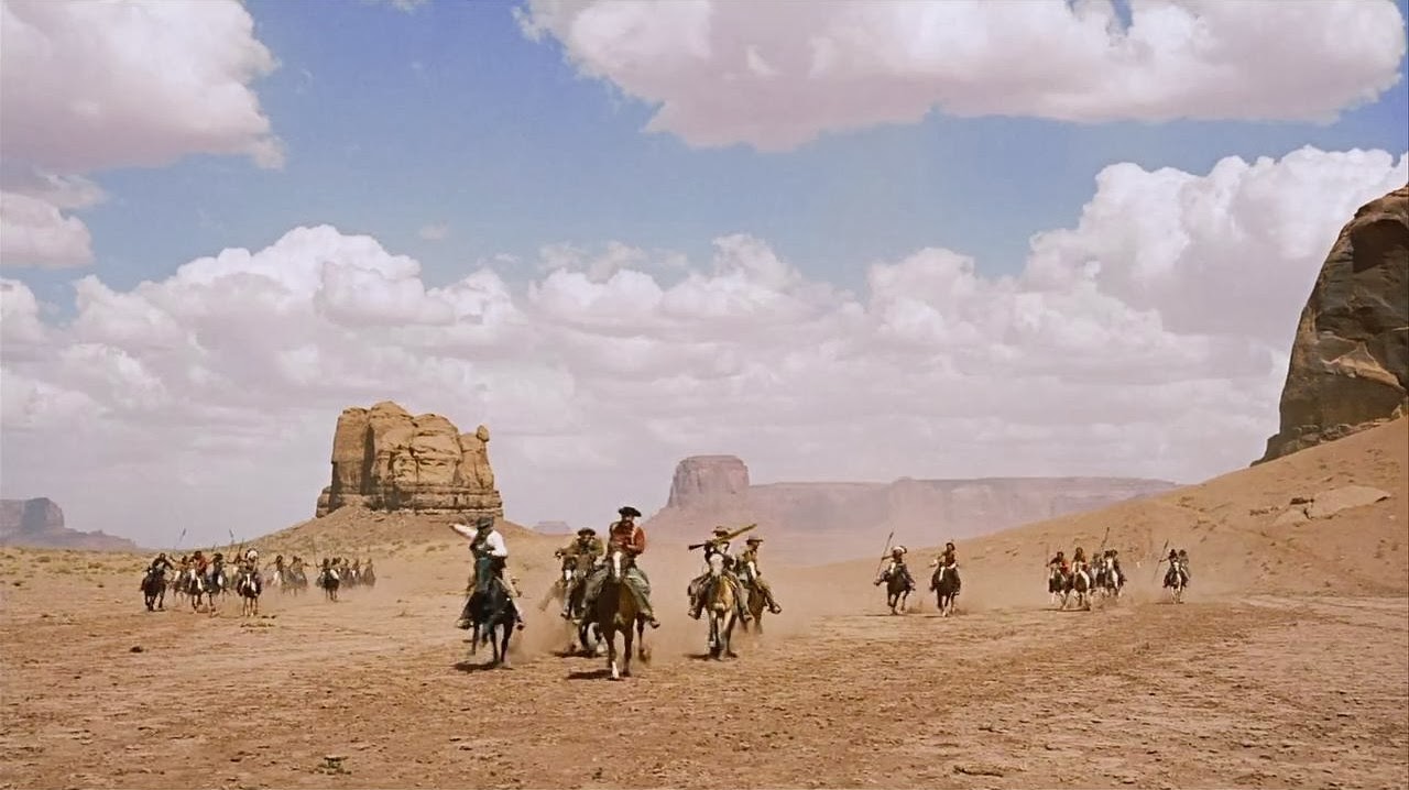 Cowboys in a desert landscape from <em>The Searchers</em>